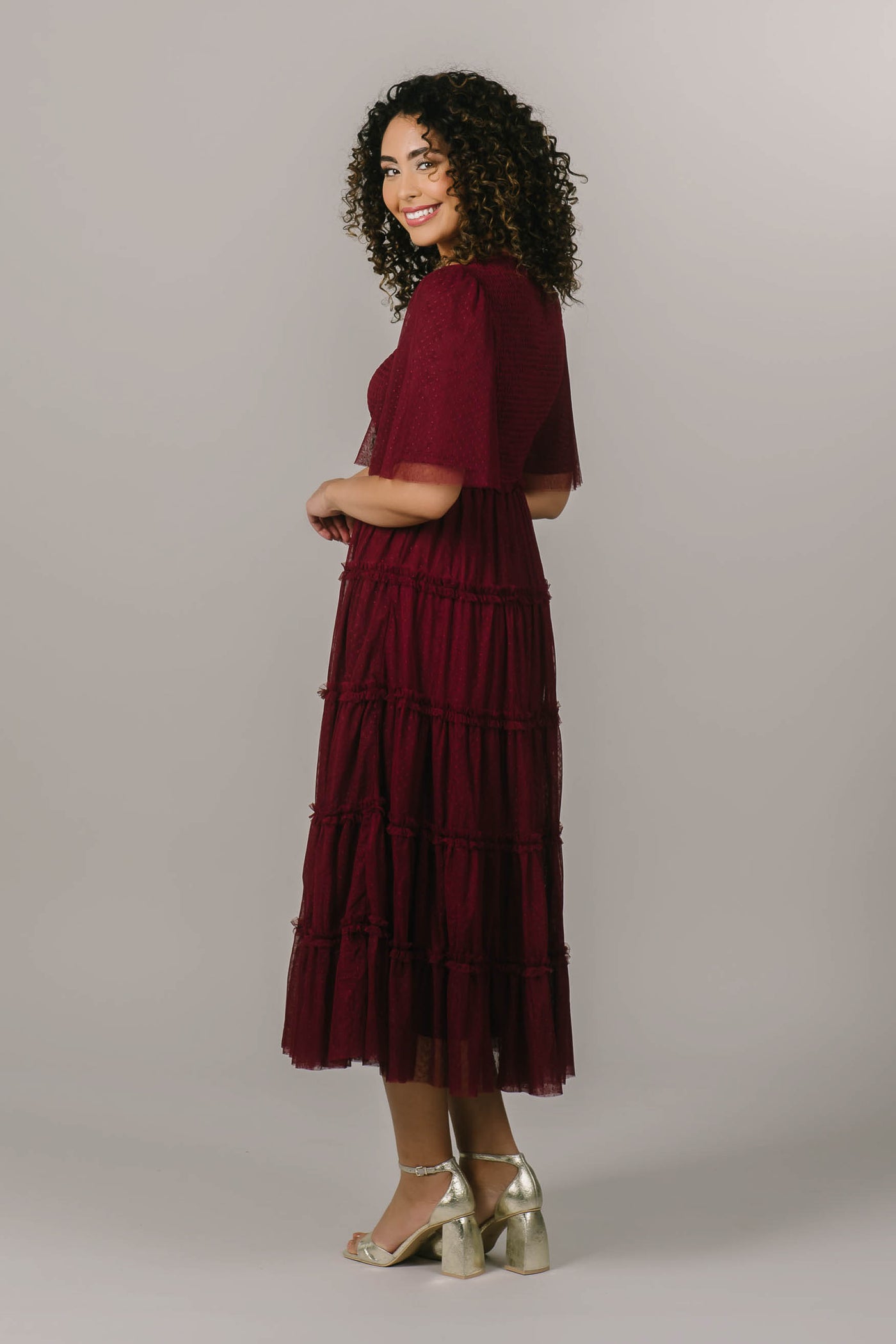 This modest dress is perfect for a bride looking for a burgundy bridesmaid dress.