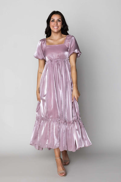 This is a modest bridesmaid dress with a shimmery mauve fabric and maxi skirt.