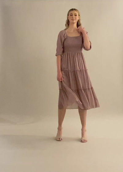 Video of the square neck line with puff sleeves and a smocked bodice and tiered panel skirt. Modest Dresses - Everyday Dresses - Modest Prom Dress - Formalwear Modest Dresses - Bridesmaid Modest Dresses.