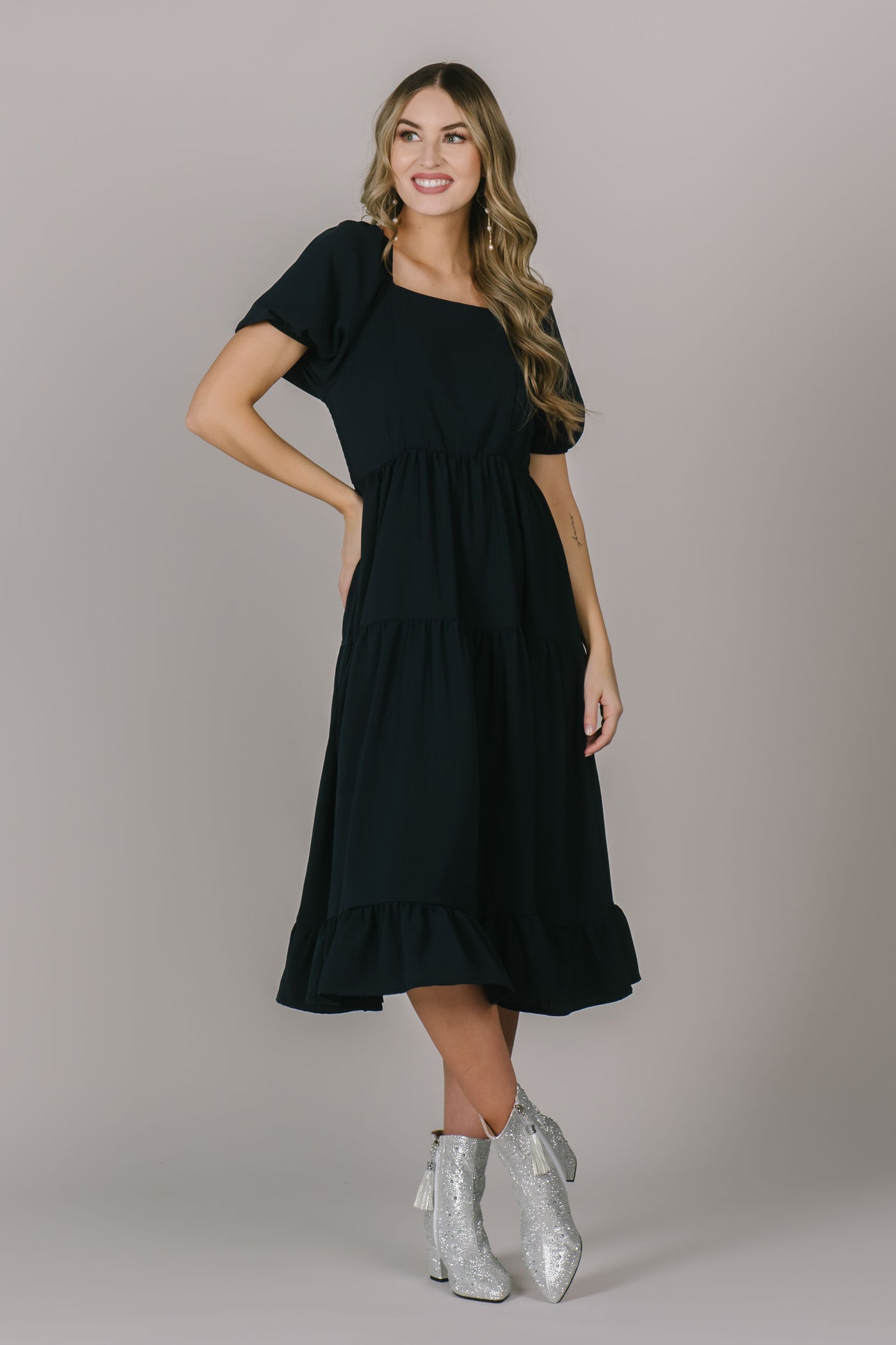 Modest dress in Utah with a flowy puff sleeve, a flattering square neck, and a flowy tiered skirt.