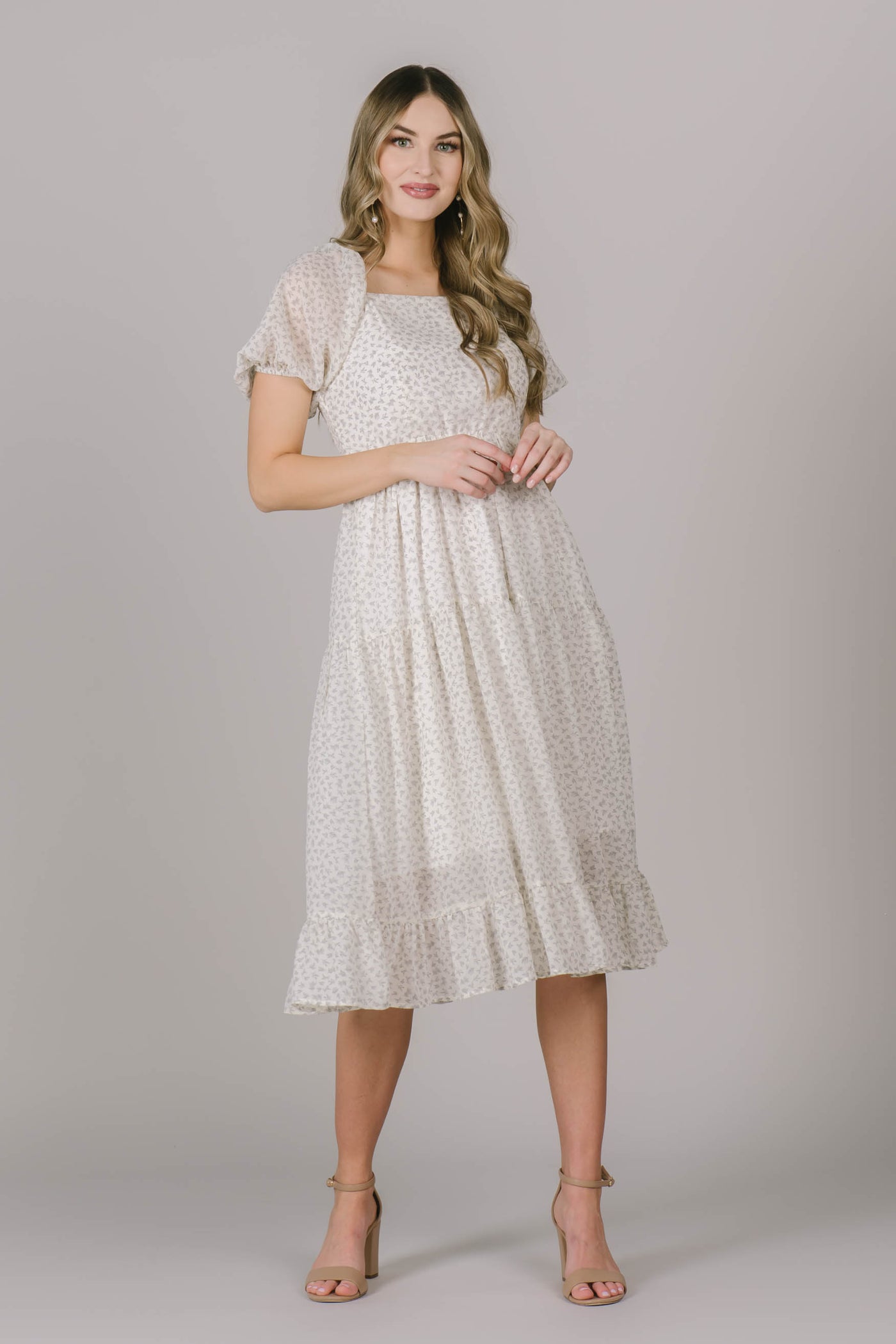Modest dress in Utah with cute puff sleeves, the most flattering square neck, and a floral pattern throughout the dress.