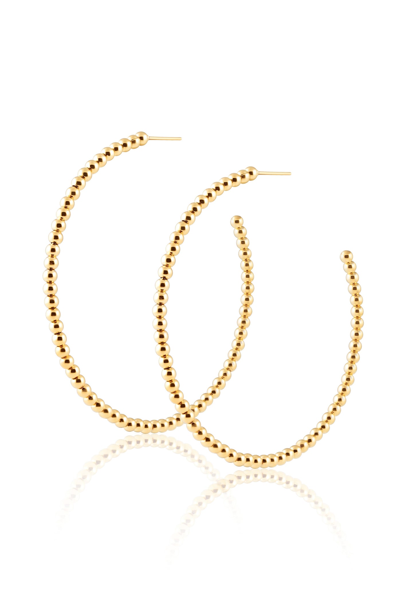 These gold metal beaded oversized hoops are the perfect accessory for everyday modest dresses. 