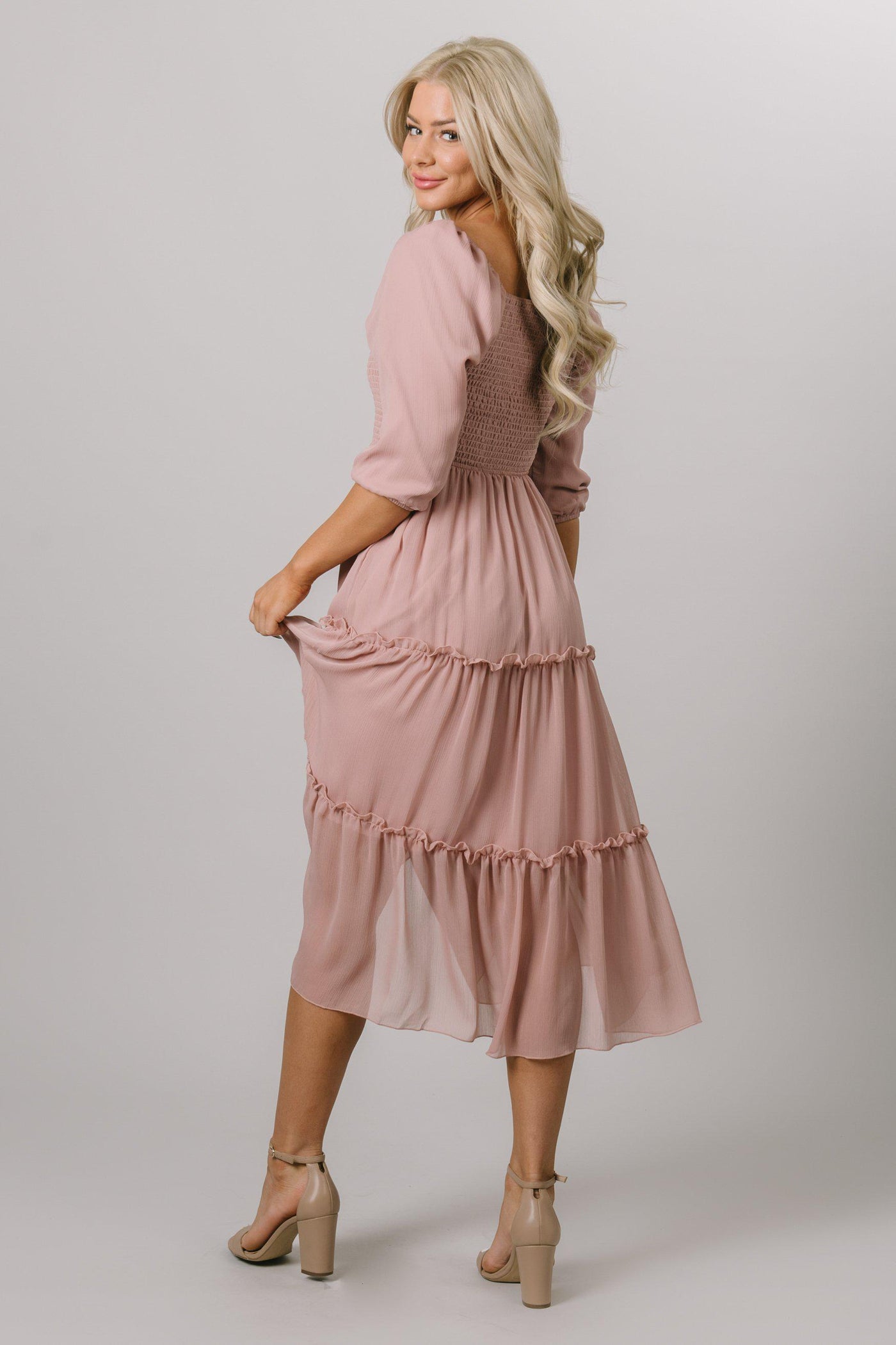 back view of smocked tiered chiffon dress in rose cloud. Modest Dresses - Modest Clothing - Everyday Modest Dresses - Bridesmaid Modest Dresses. 