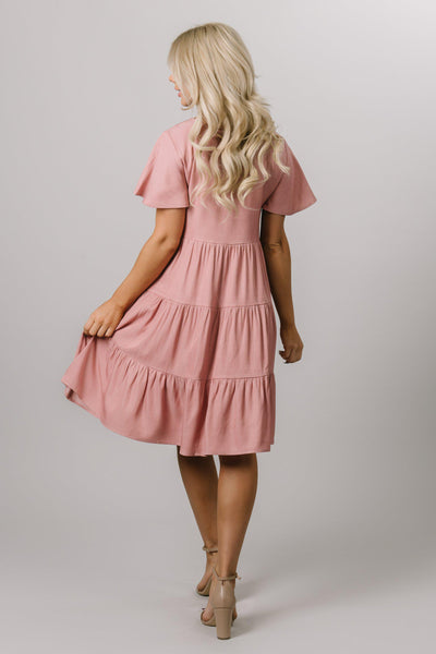 Modest Dresses - Modest Clothing - Everyday Modest Dresses - Bridesmaid Modest Dresses The back view of this knee length dress with three tiered panels. This swing dress is in dusty pink. 
