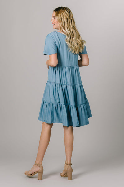 We're in love with this tiered modest dress from Moments Made that features flutter sleeves and a round neckline. - Modest Clothing - Modest Dresses - Modest Everyday Dresses