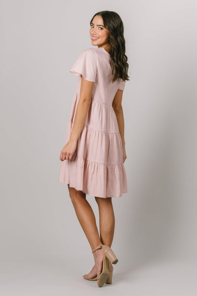 This modest style dress features a crepe material with tiers throughout the knee length cut. - Modest Dresses - Modest Clothing - Modest Everyday Dresses