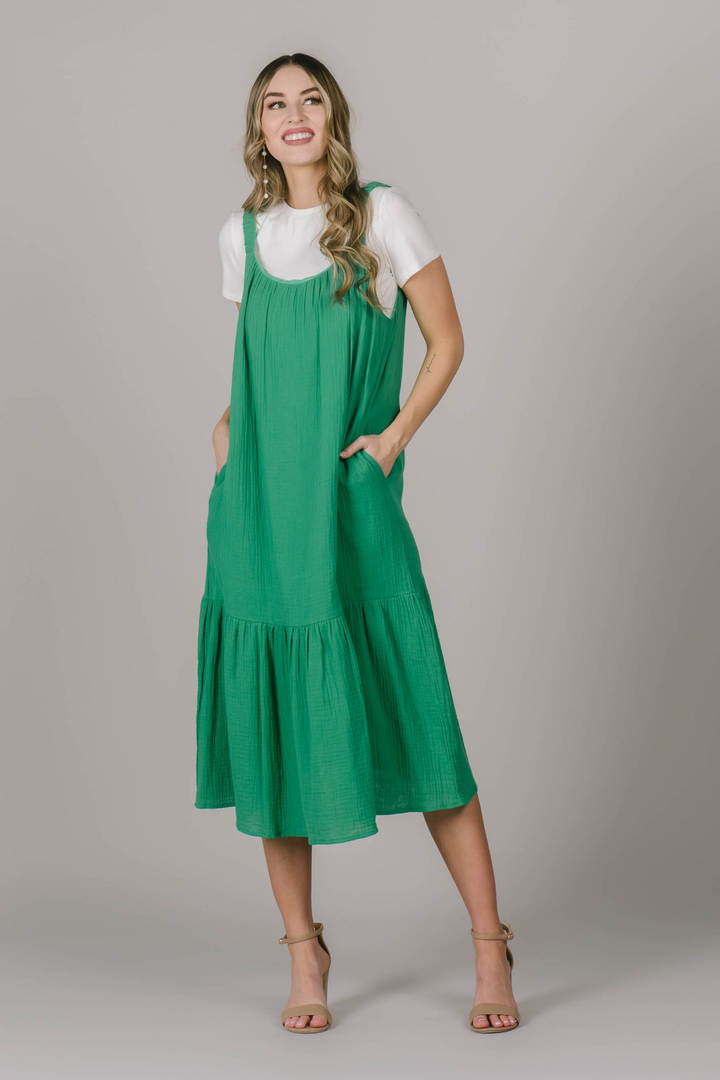 Modest dress in Utah in a cute green color perfect for spring/ summer, a light flowy feel, and perfect for wearing over a t shirt.