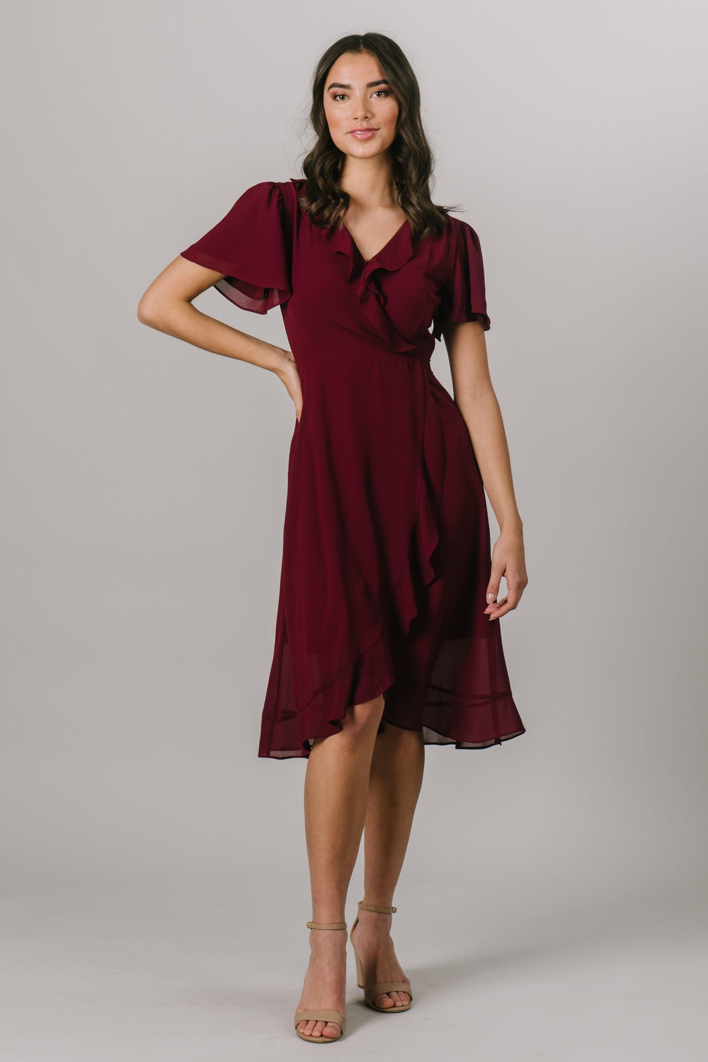This fun modest dress is perfect for your everyday moments! It features a flattering fit and ruffles following the wrap shape! The sleeves also add a touch of fun!  Also available in Navy. Modest Dresses - Modest Clothing - Everyday Modest Dresses - Bridesmaid Modest Dresses. 