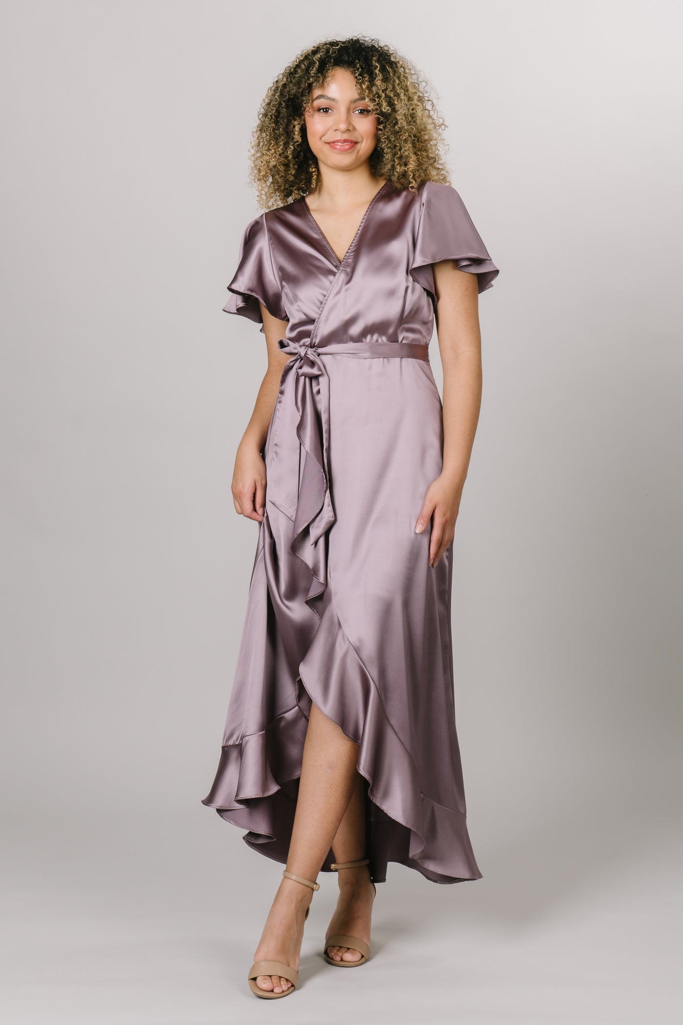 A satin dress in light mauve, it wraps and you can tie it with a bow. Modest Dresses - - Everyday Dresses - Modest Prom Dress - Formalwear Modest Dresses - Bridesmaid Modest Dresses.
