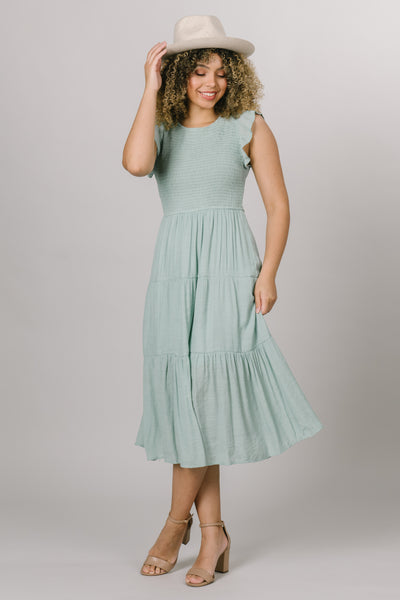 Light mint dress with short sleeves and a smocked bodice. Modest Dresses - - Everyday Dresses - Modest Prom Dress - Formalwear Modest Dresses - Bridesmaid Modest Dresses.