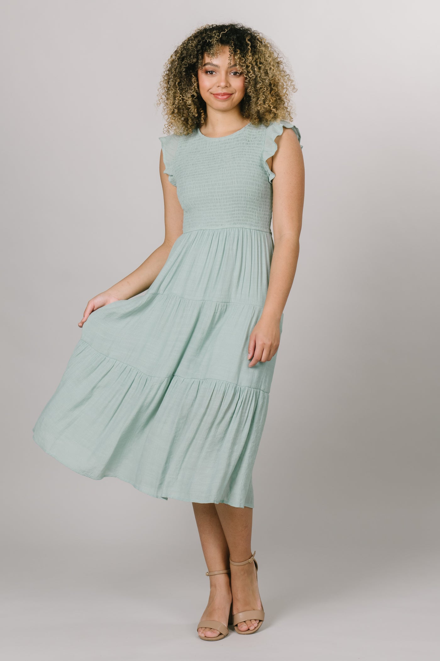Smocked bodice and a high neckline in the shape of a scoop. Modest Dresses - - Everyday Dresses - Modest Prom Dress - Formalwear Modest Dresses - Bridesmaid Modest Dresses.