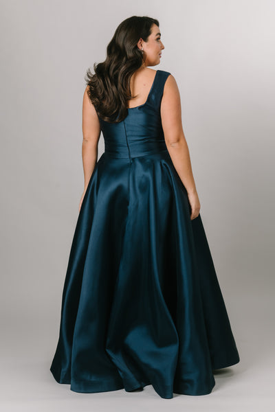 Modest Dresses - Modest Prom Dress - Formalwear Modest Dresses - Bridesmaid Modest Dresses This back view of the dress has a low back and flowy bottom skirt.