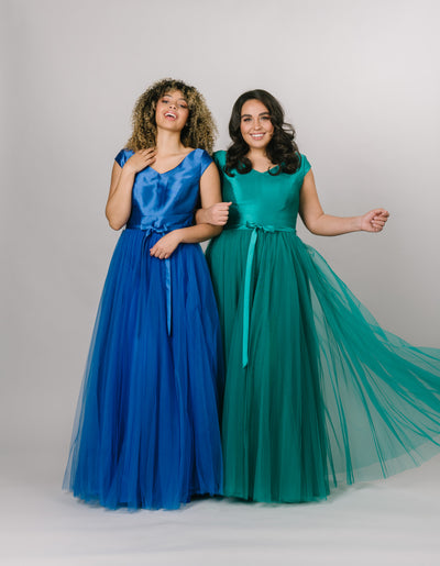 Modest Dresses - Modest Prom Dress - Formalwear Modest Dresses - Bridesmaid Modest Dresses Models showcasing the tulle bottom with a bow belt in blue and green color options.