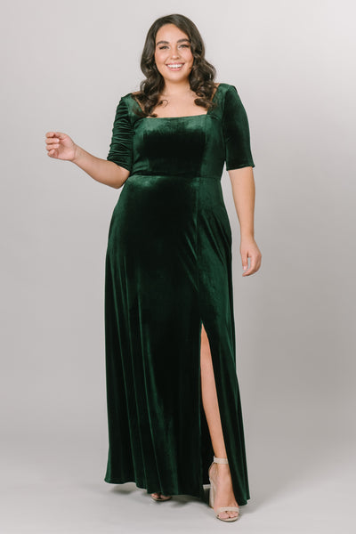 Modest Dresses - Modest Prom Dress - Formalwear Modest Dresses - Bridesmaid Modest Dresses.  This is a velvet green long gown with a slit in the skirt and a square neckline with 3/4 sleeves. 