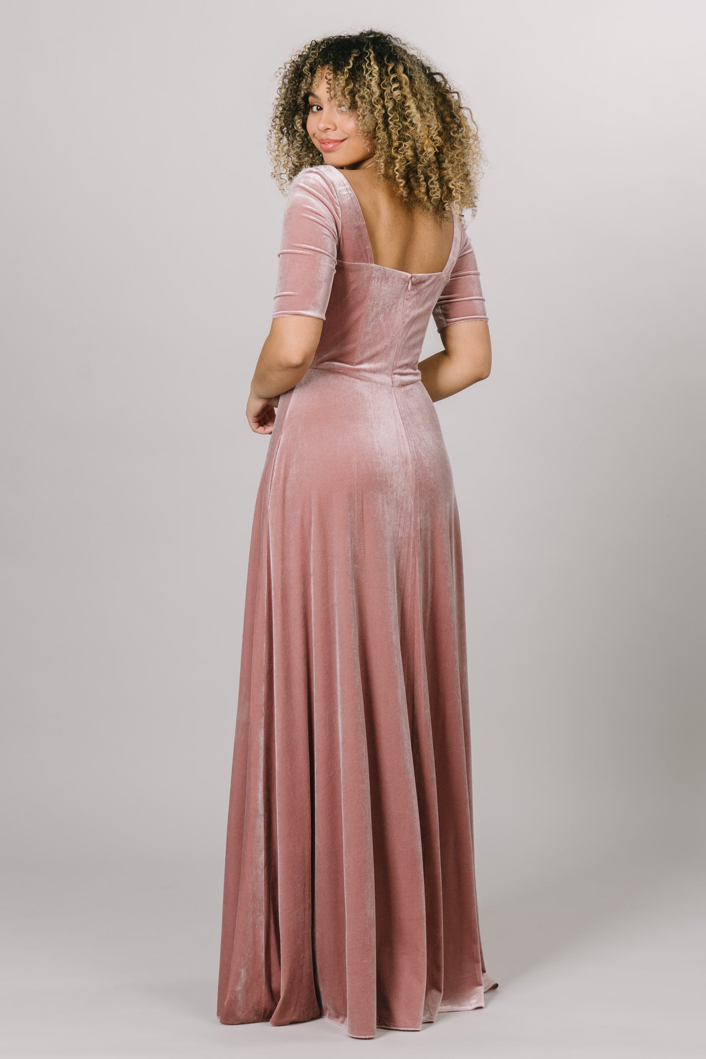 Back view of velvet pink dress with a low back. Modest Dresses - Modest Prom Dress - Formalwear Modest Dresses - Bridesmaid Modest Dresses. 